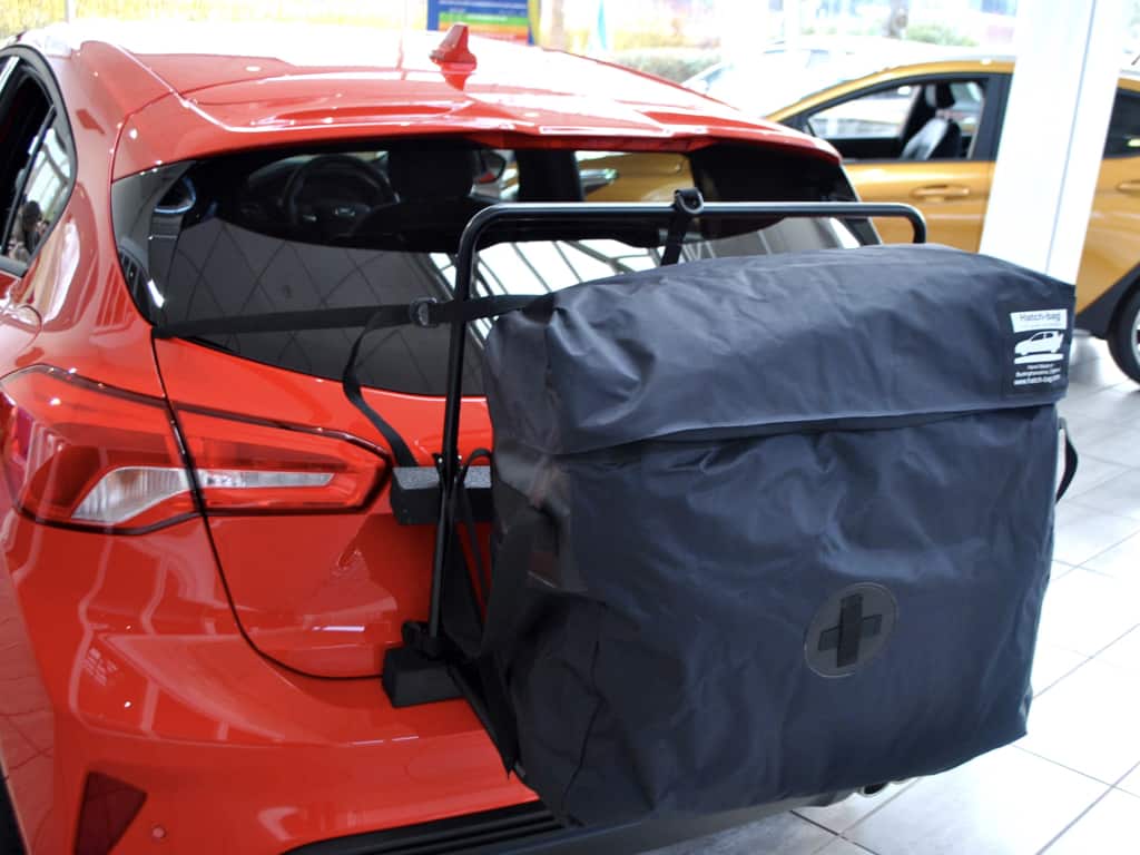 2019 ford focus in red with a hatch-bag roof box alternative fitted to the rear