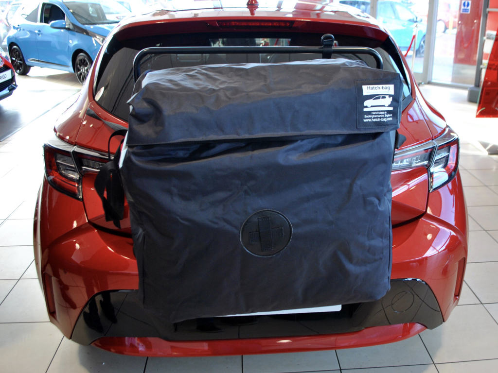 red 2019 toyota corolla hatchback with a hatch-bag roof box alternative fitted