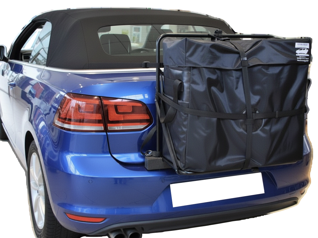 Bllue VW Golf mk6 convertible with a hatchbag luggage rack fitted to the rear photographed from the rear in a VW Showroom